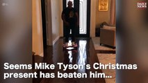 Mike Tyson falls off hoverboard