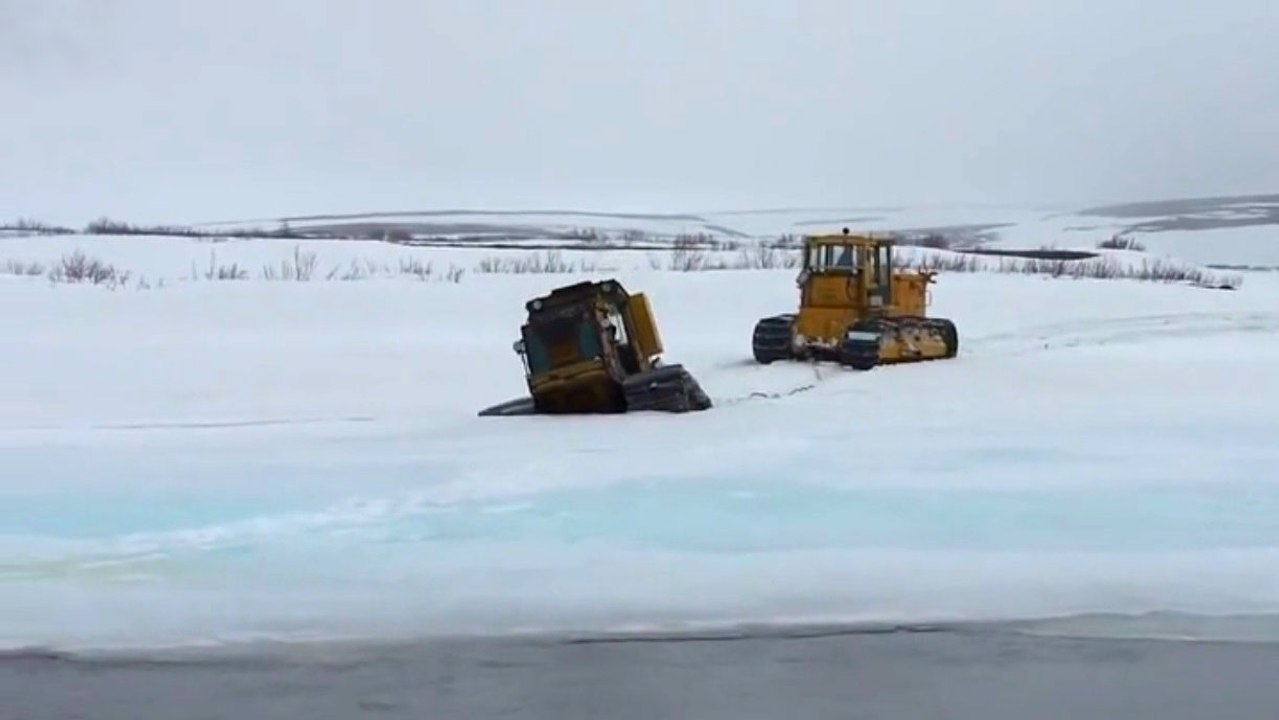 Bulldozer Falls Through Ice
