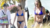 Cara Delevingne Flaunts Her Boobs & Sexy Legs In Blue Bikini