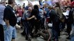 Trump Supporter Drags Latino Protestor Out Of Rally