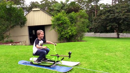 Dad makes mowing the lawn far more fun for his kids