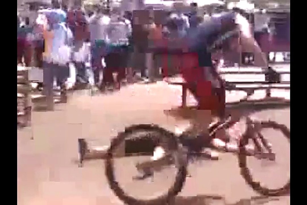 Talented boy making trick by cycle