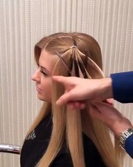 Cabeleireiro russo transforma cabelo num chapéu