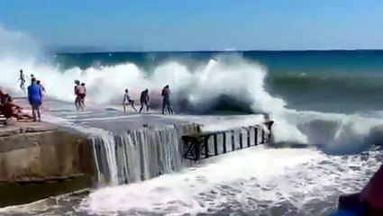 Fail Couple Watch The Waves During a Storm Surge