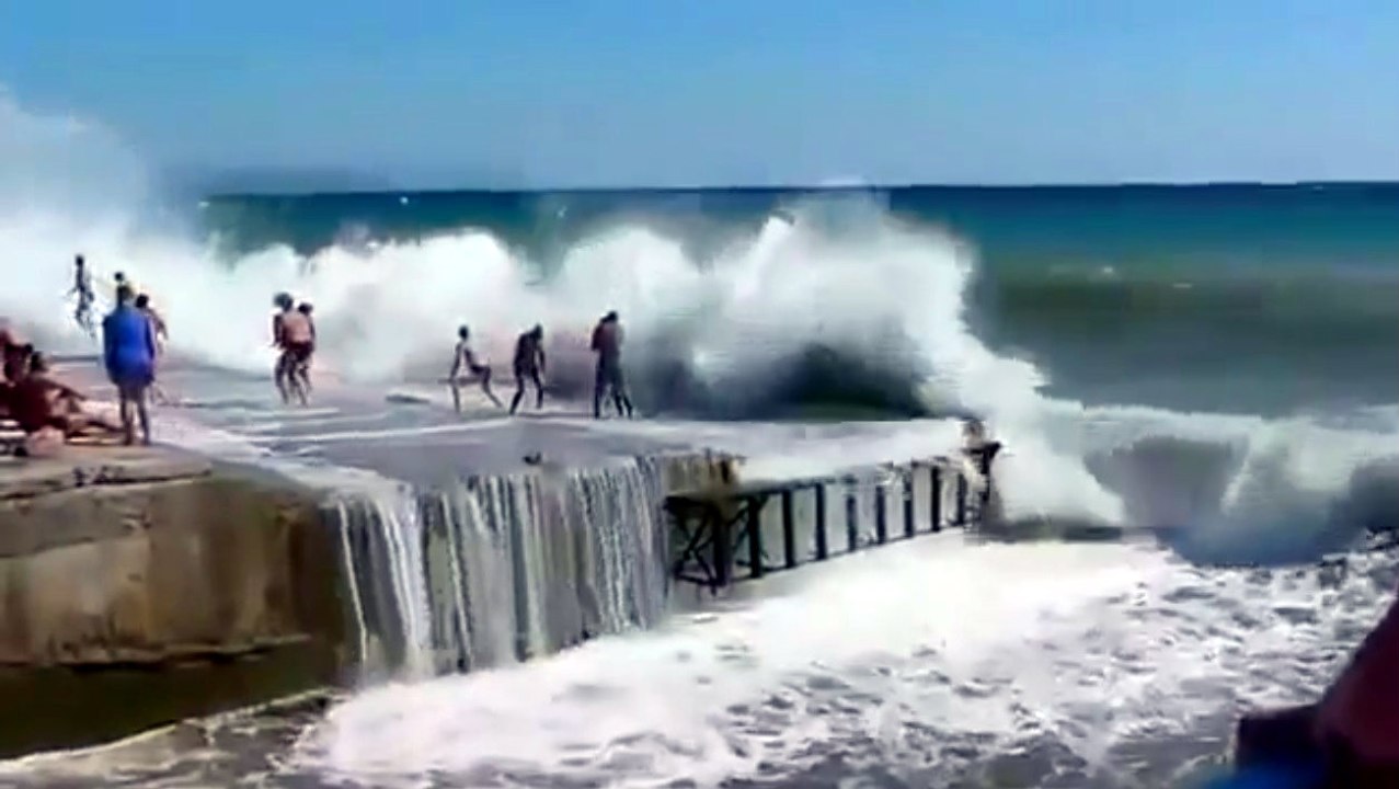 Fail Couple Watch The Waves During a Storm Surge