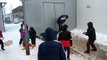 Syrian kids fighting Policeman with snowballs in refugee Camp is pure love!