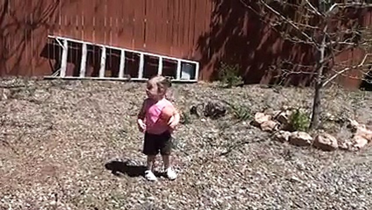 baby and dad talk through a window