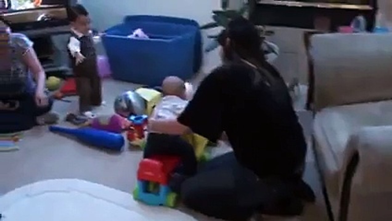 baby eats toy