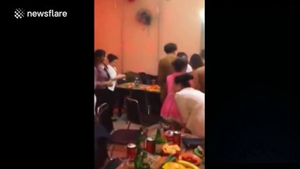 Drunk man throws cash at party with former classmates