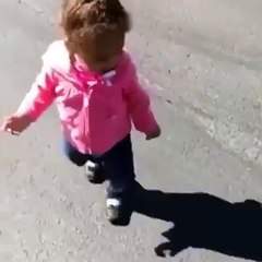 baby scaring with her own shadow................