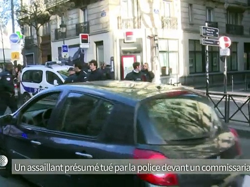 Un an après Charlie, un homme armé criant "Allah Akbar" tué devant un commissariat à Paris