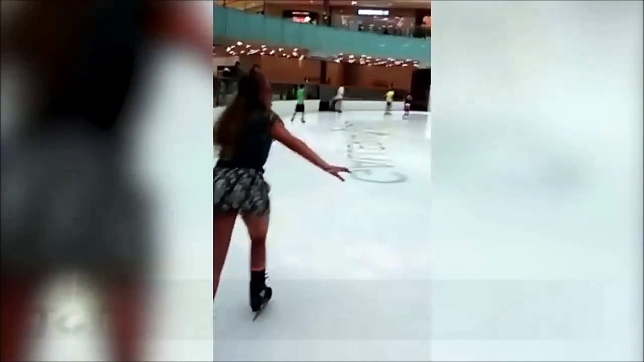 Girl skates on ice first time