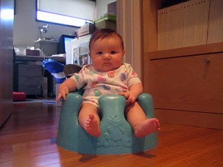 What's so funny? Funny Baby giggling in the bumbo