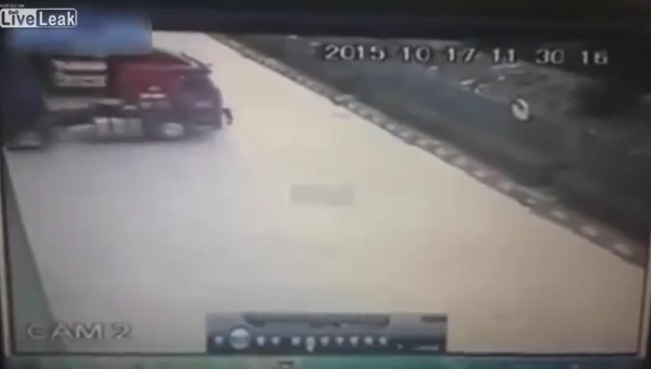 Man Tries To Stop A Rolling Truck