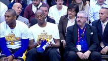 Kobe Bryant Signs Sneakers for Young Fan