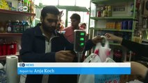 Greek village copes with influx of refugees | DW News
