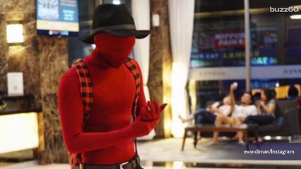 Japanese wear face covering, full-body suits to "let loose" after work