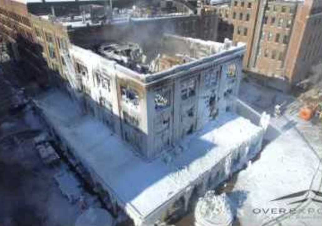 Ice Forms on Gutted Building in Omaha After Fir...