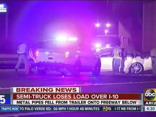Semi-truck loses load over Interstate 10