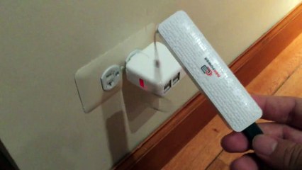 4 USB port hub with retractable outlet prongs to recharge your electronics