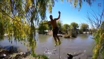 Brave Man Walks On A Rope Over A Swamp Filled With Alligators!