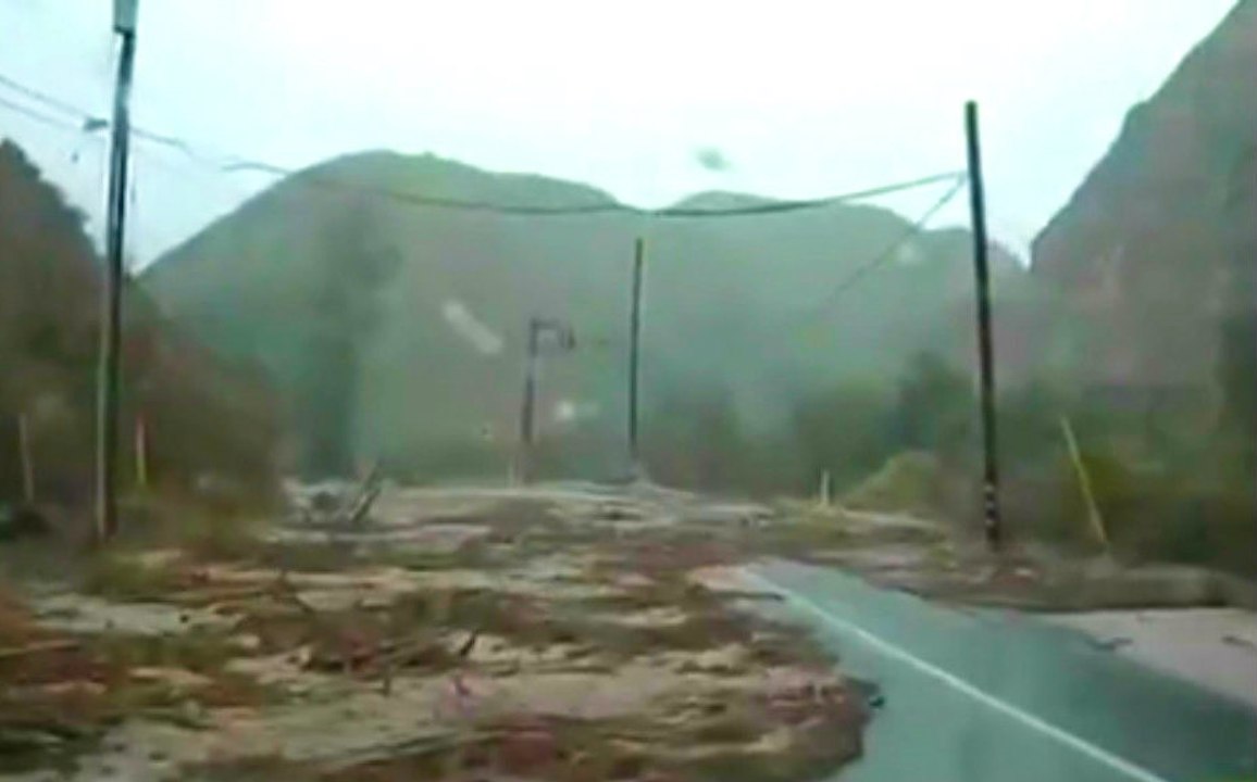 Driver Surprised By Flash Flood Coming Around The Corner