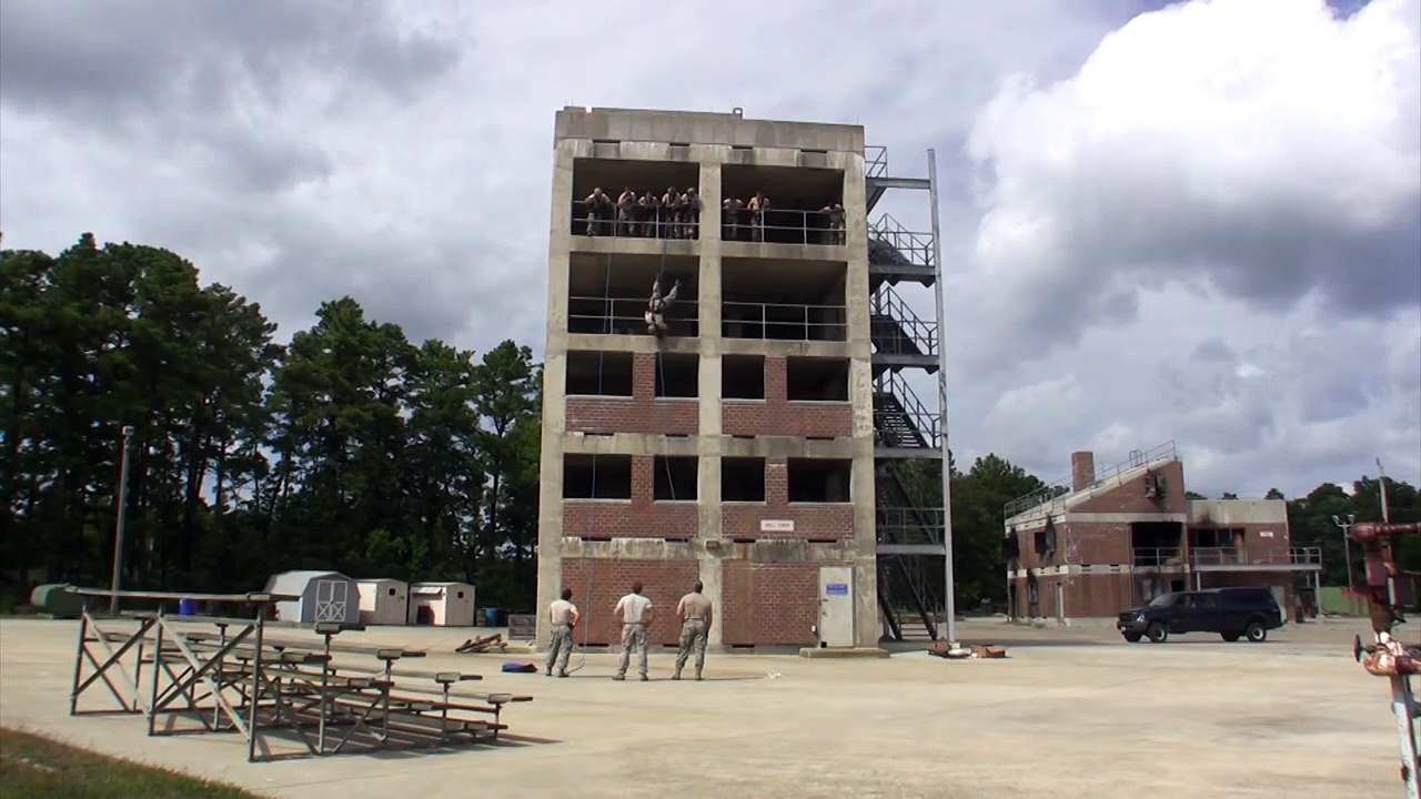 US Air National Guards Training to Tactical Building Assault With SWAT Team Member