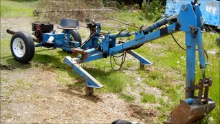Diy self propelled backhoe that turns into a trailer replacing a culvert