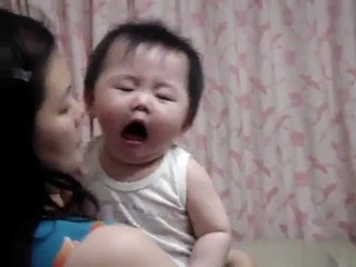 Baby french kissing with Mommy