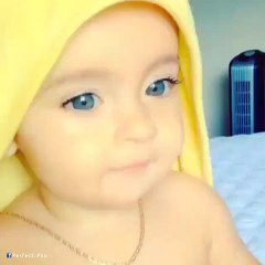 beautiful blue eyes baby playing