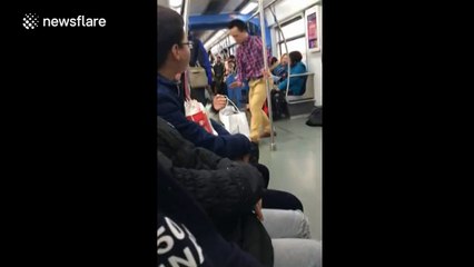Man pole dances on train in China
