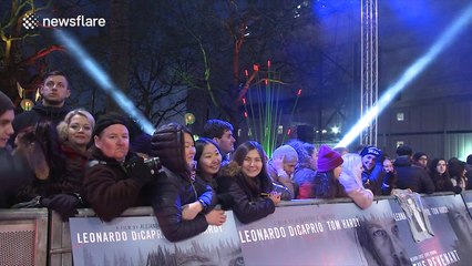 Excited Leonardo DiCaprio fans wait at the premiere of The Revenant