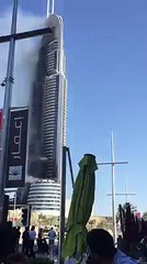 Almost 15 hours after the fire broke out, smoke still billows from ‪#‎Dubai‬ hot