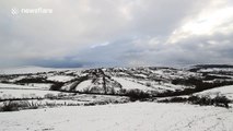 Beautiful footage of snow-covered mountain pass in Northern Ireland