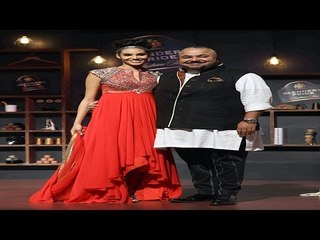 A model Flaunts A Layered, Flowy Gown From JJ Valaya's Creation