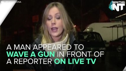 Man Waves Gun In Front Of Reporter On Live TV