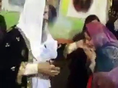 This Maulana Sahab Kissing and hugging the women !! Is this what Islam Teach Us ??