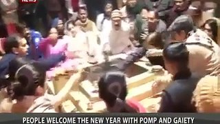 People welcome the new year with pomp & gaiety
