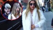 Gigi Hadid and Zayn Malik hold hands while checking out of NYC Hotel (EVENT)