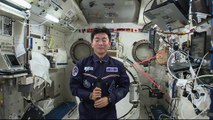 Space station crew member talks to Japanese media