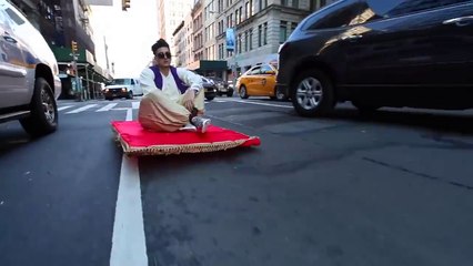 Alladin on Magical carpet in busy streets