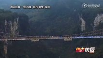 Glass bridge across Zhangjiajie Grand Canyon to be opened to tourists by June 2016.