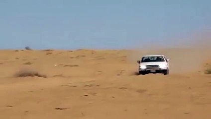 Download Video: A small pickup truck climbs a giant sand dune - Toyota Hilux