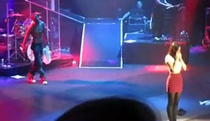 Trey Songz with a fan on stage_ Manchester.