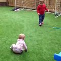 funny child playing football