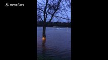 Amazing footage of jet skier doing tricks on a flooded football pitch