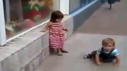 Cutest baby boy not giving up to kiss a cute  baby girl