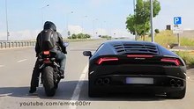 تحدي أسطوري بين لامبورغيني هوريكان ودراجة 14 CBR 1000RR اربطوا أحزمتكم