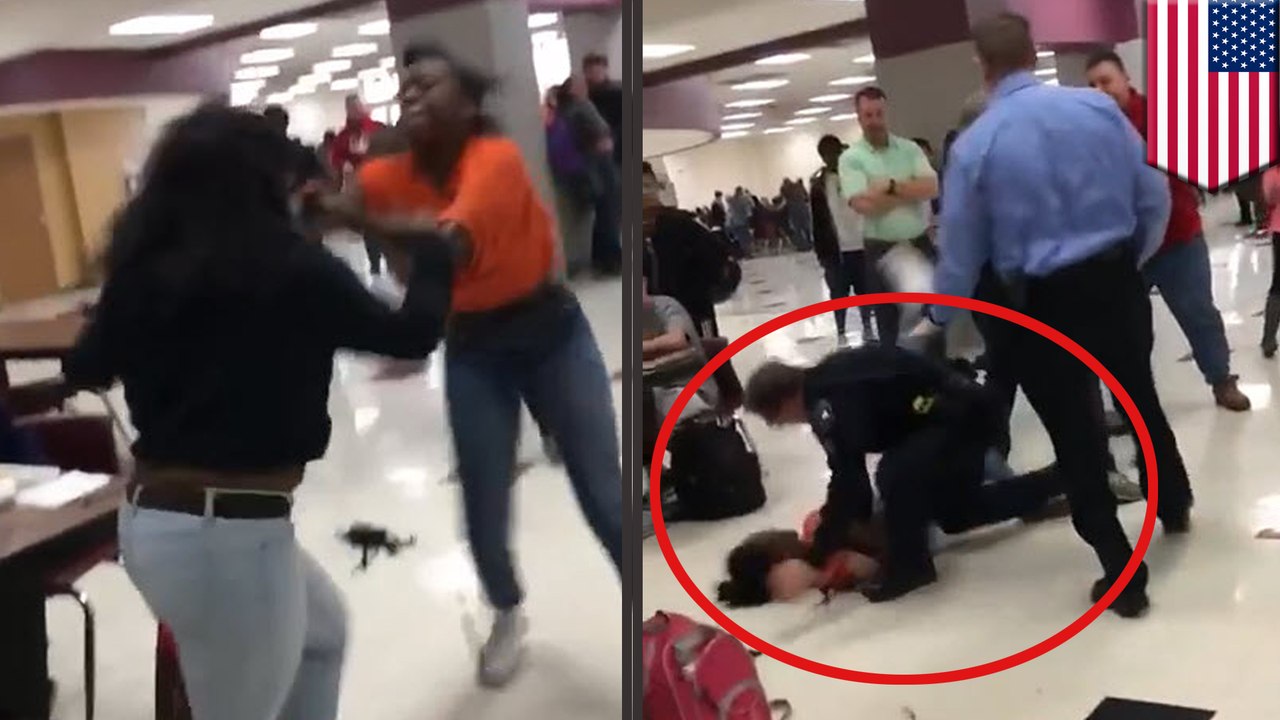 Officer trying to break up school brawl knocks teen unconscious by slamming her head to the floor