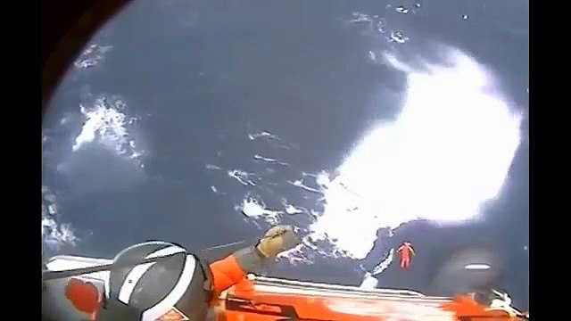 LiveLeak - Coast Guard Hoists Sailor In Distress In Heavy-weather Rescue